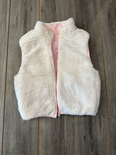 So girly reversible vest